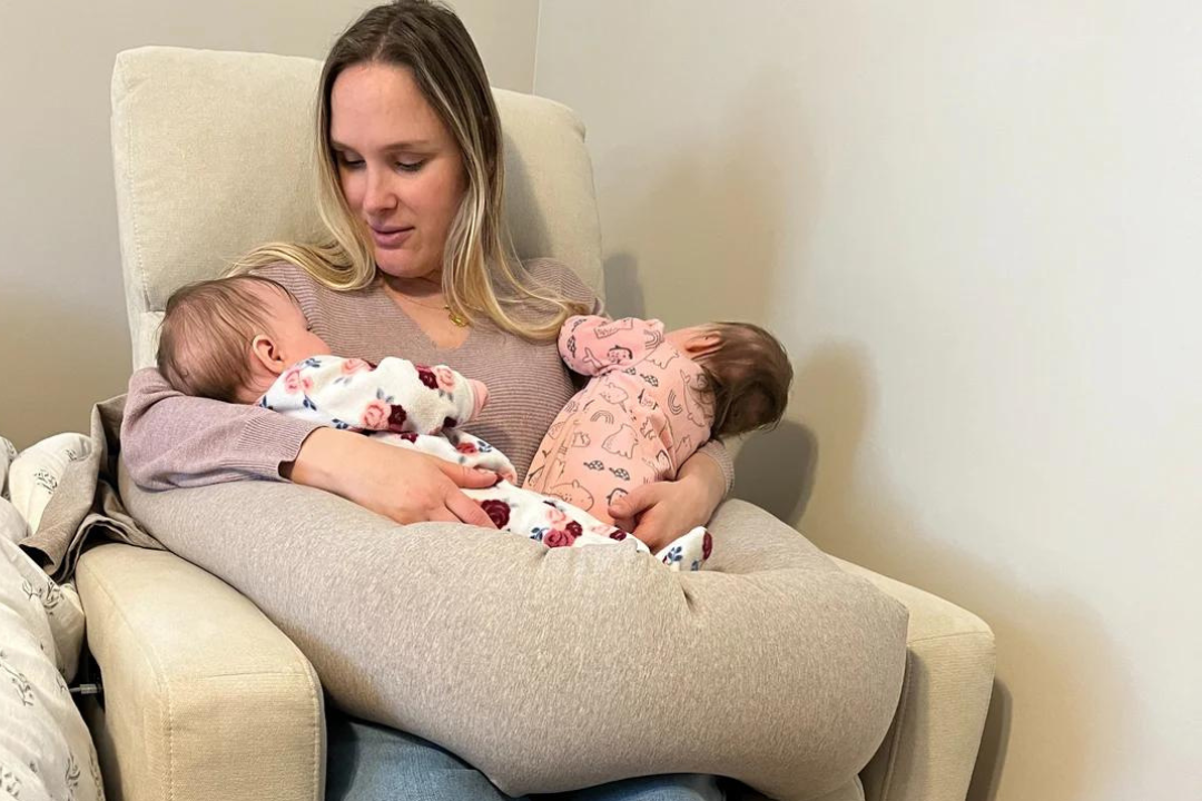 mom nursing twins with bbhugme pregnancy pillow